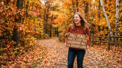 A woman laughing on a rustic trail covered in autumn leaves, holding a wooden sign with fall puns text.