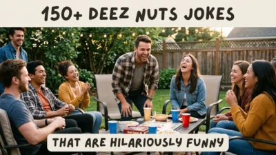 Group of happy young friends smiling and laughing together around an outdoor patio table in a backyard