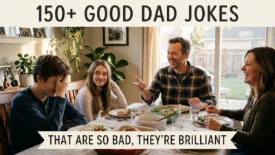 Smiling father telling a story at the dinner table while his family laughs and reacts joyfully